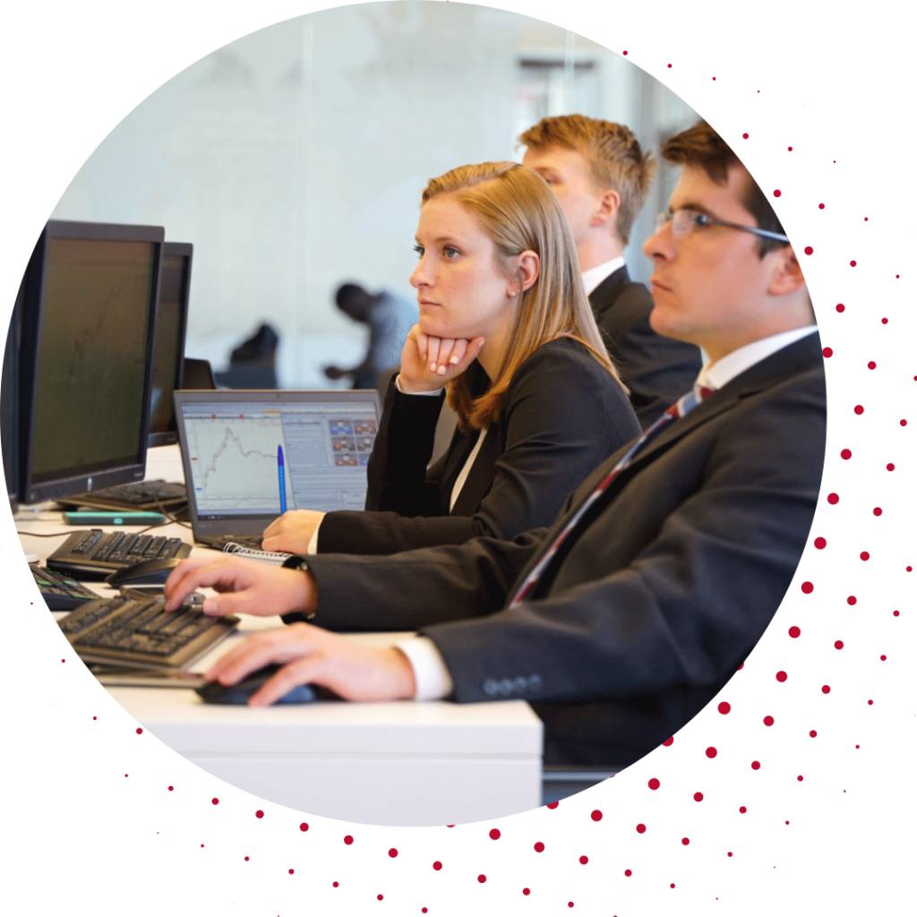 adult students in computer lab in formal dress